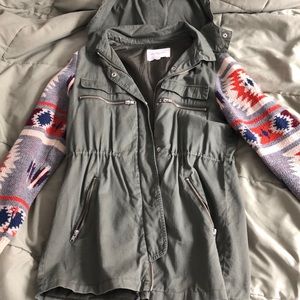 Green parka with sweater arms